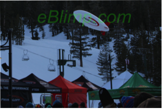 primaloft rc blimp flying at ski resorts in the mountains with snow 